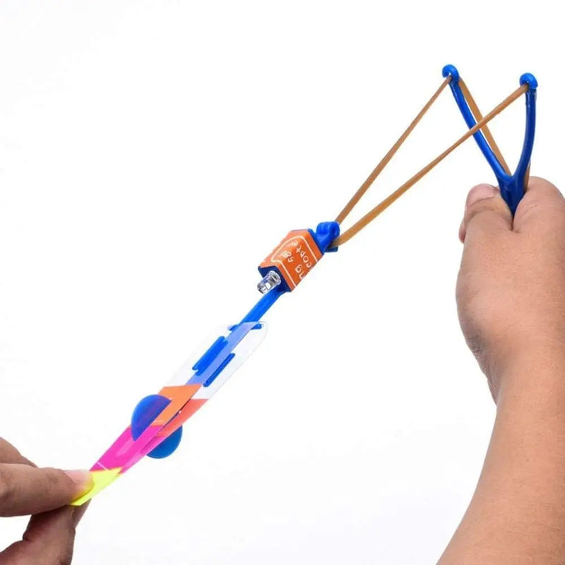 Led Light Arrow Helicopter Slingshot ejection Flying Toy  Kids Adult Mini Flying Toy Blue/Flash Light Rubber Band Catapult Toys